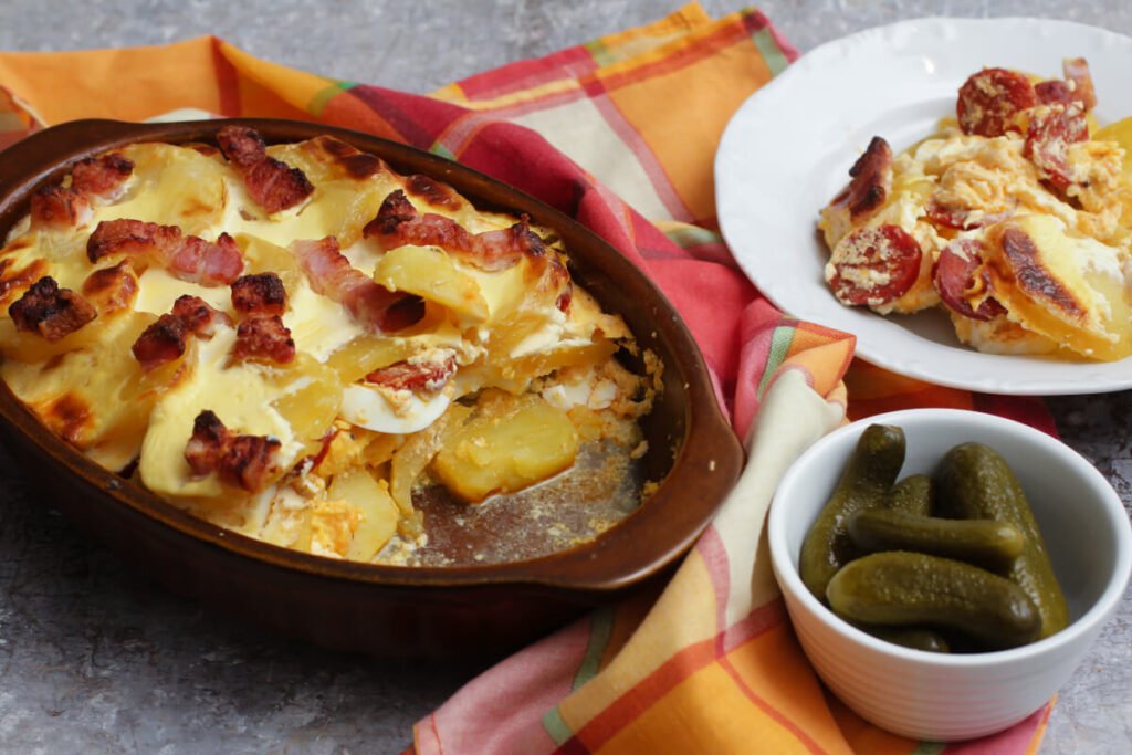 layered potatoes in a pan and served with pickles